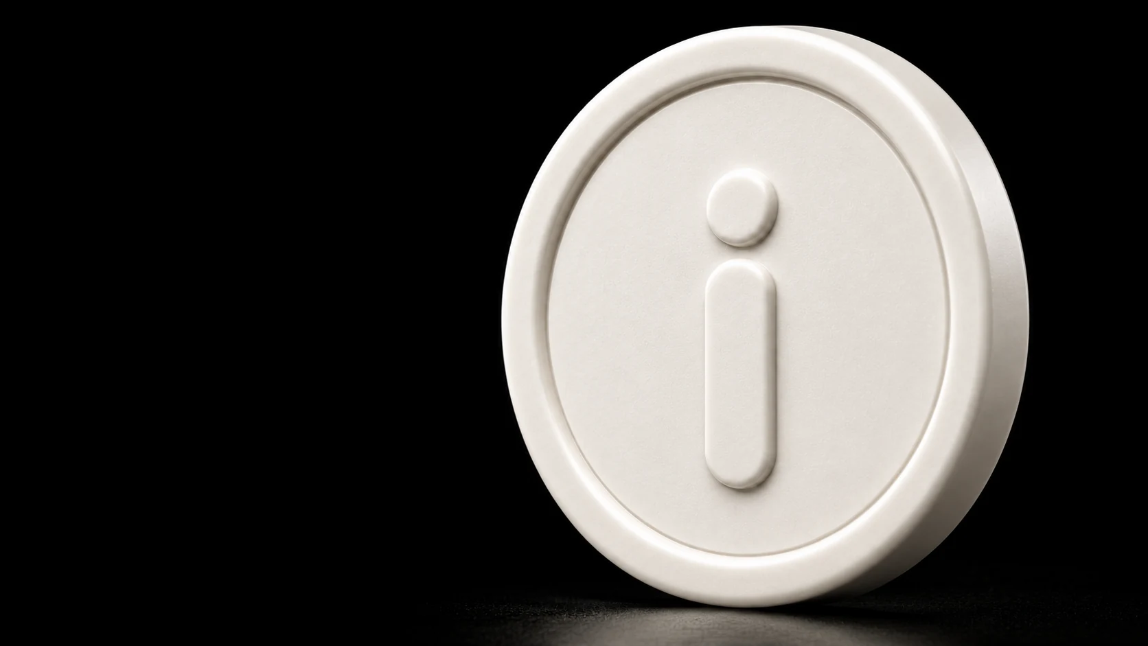 A close study of iCoin’s matte ceramic surface, softly beveled rim and raised i