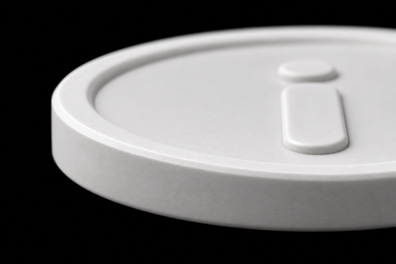 Close-up of the sculpted ceramic i and softly beveled rim
